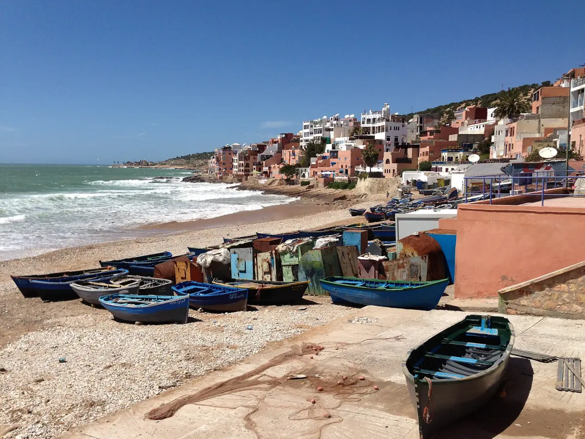 Blue fishing boats on the beach at Taghazout