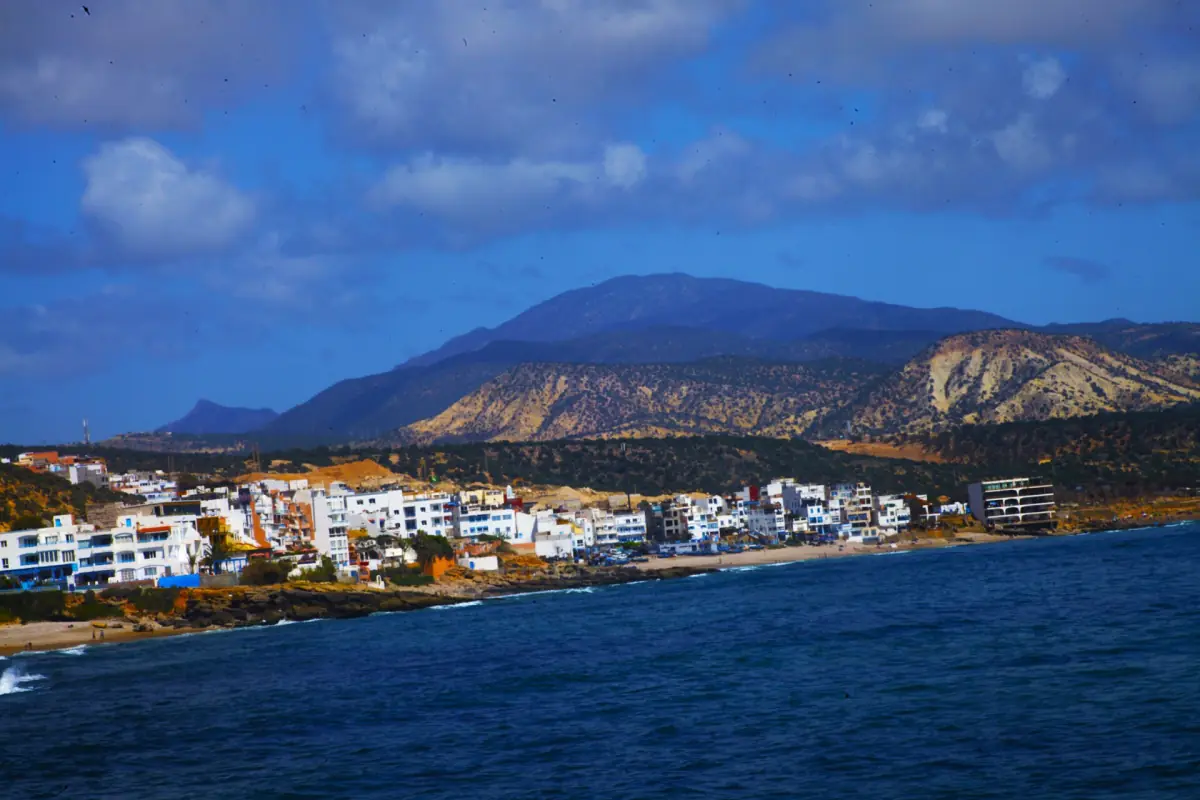 Taghazout and its bay below the mountains